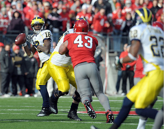 Denard Robinson (16) and Darryl Stonum (22)