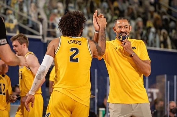 Isaiah Livers (2), Juwan Howard, and Jaron Faulds (44)