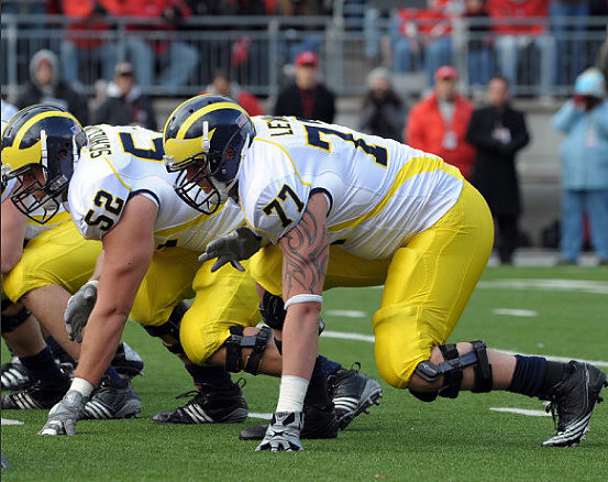 Stephen Schilling (52) and Taylor Lewan (77)