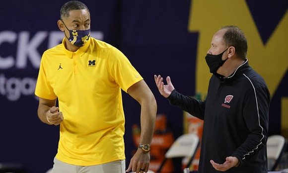 Juwan Howard and Wisconsin Head Coach Greg Gard