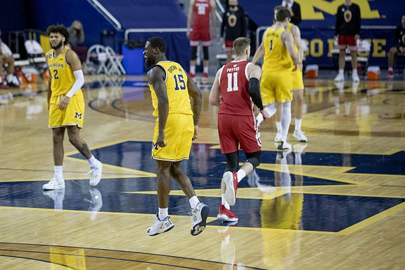 Isaiah Livers (2), Chaundee Brown Jr. (15), and Hunter Dickinson (1)
