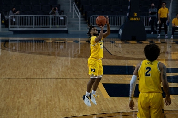 Mike Smith (12) and Isaiah Livers (2)