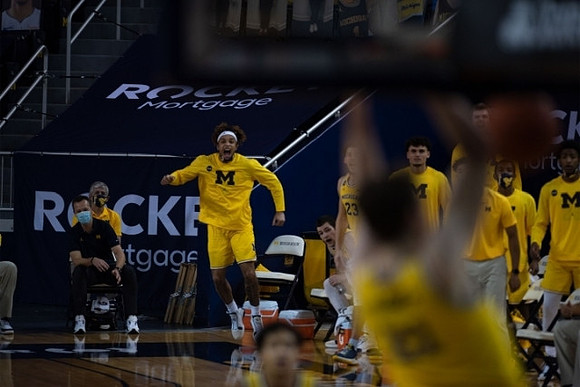 Franz Wagner (21) and Michigan Team