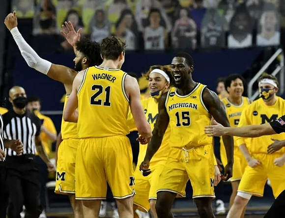 Franz Wagner (21), Isaiah Livers (2), Terrance Williams II (5), Chaundee Brown Jr. (15), Eli Brooks (55), and Luke Wilson (32)