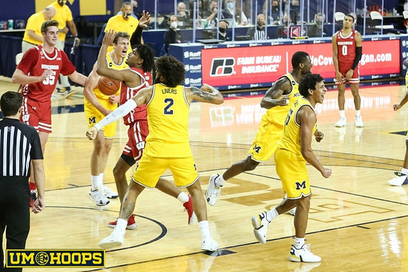 Isaiah Livers (2), Franz Wagner (21), Eli Brooks (55), and Chaundee Brown Jr. (15)