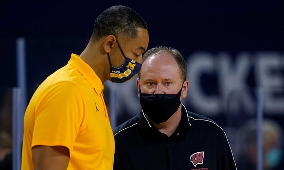 Juwan Howard and Wisconsin Head Coach Greg Gard