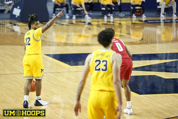 Mike Smith (12) and Brandon Johns Jr. (23)
