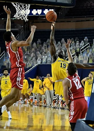 Chaundee Brown Jr. (15) and Isaiah Livers (2)