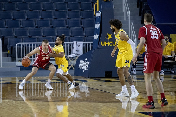 Mike Smith (12) and Isaiah Livers (2)