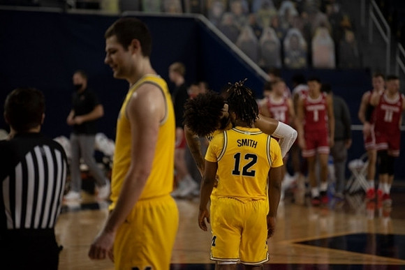 Hunter Dickinson (1) and Mike Smith (12)