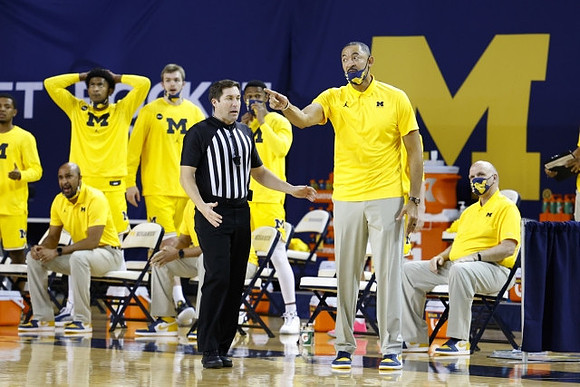 Juwan Howard and Phil Martelli