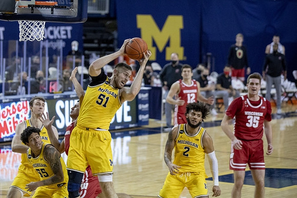Franz Wagner (21), Eli Brooks (55), Austin Davis (51), and Isaiah Livers (2)