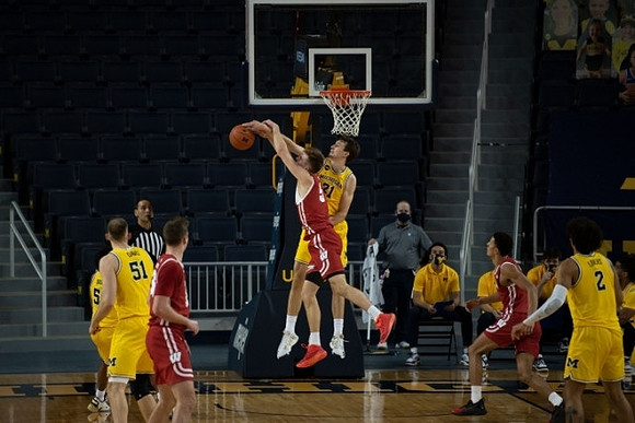 Eli Brooks (55), Austin Davis (51), Franz Wagner (21), and Isaiah Livers (2)