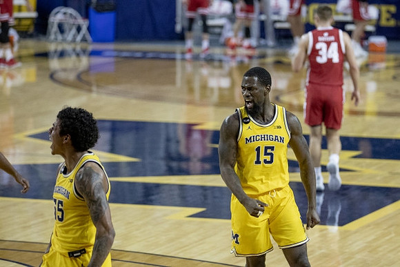 Eli Brooks (55) and Chaundee Brown Jr. (15)