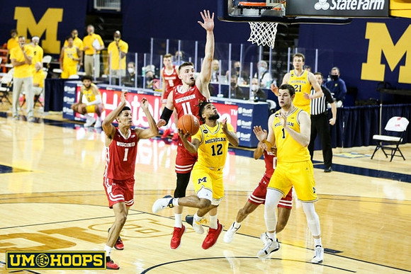 Mike Smith (12), Hunter Dickinson (1), and Franz Wagner (21)