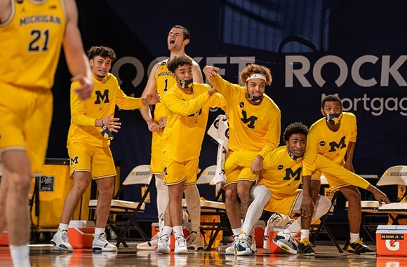 Franz Wagner (21) and Michigan Team