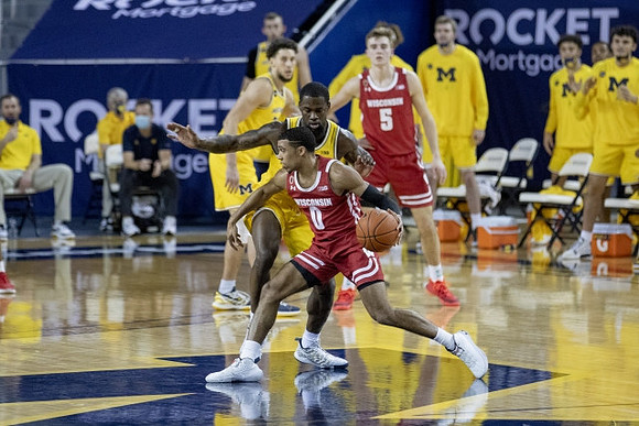 Chaundee Brown Jr. (15) and Brandon Johns Jr. (23)