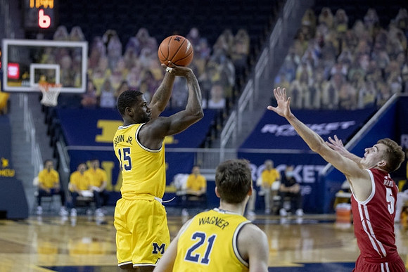 Franz Wagner (21) and Chaundee Brown Jr. (15)
