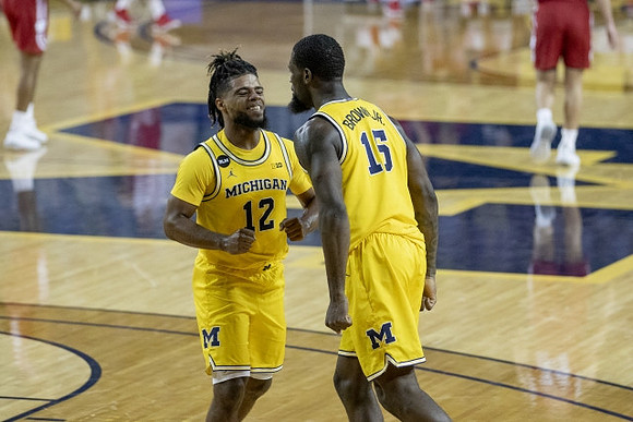 Mike Smith (12) and Chaundee Brown Jr. (15)