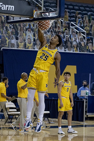 Jace Howard (25) and Adrien Nunez (0)