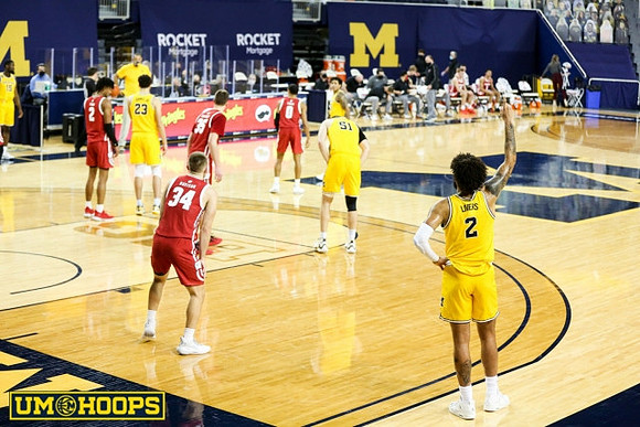 Isaiah Livers (2), Brandon Johns Jr. (23), Austin Davis (51), and Eli Brooks (55)