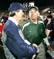 Lloyd Carr and John L. Smith