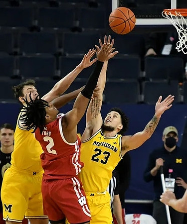 Franz Wagner (21) and Brandon Johns Jr. (23)