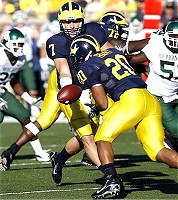 Chad Henne, Michael Hart, and Rueben Riley Jr.
