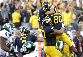 Mario Manningham, Chad Henne, Mike Massey, and Jake Long