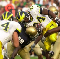 Jerome Jackson (24) and Mark Bihl (54)
