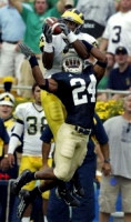 Braylon Edwards (1) and Garrett Rivas (38)