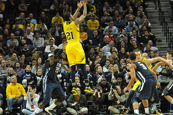 Zak Irvin (21) and Mark Donnal (34)
