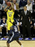 Derrick Walton Jr. (10) and Villanova Head Coach Jay Wright