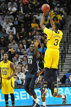 Derrick Walton Jr. (10) and Kameron Chatman (3)