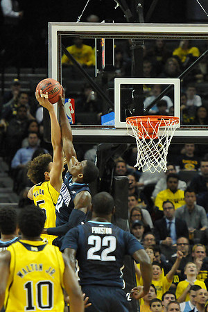 Derrick Walton Jr. (10) and D.J. Wilson (5)