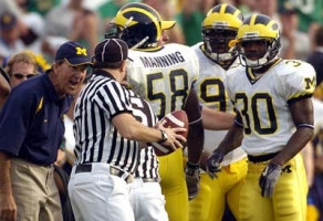 Lloyd Carr, Markus Curry (30), and Roy Manning (58)