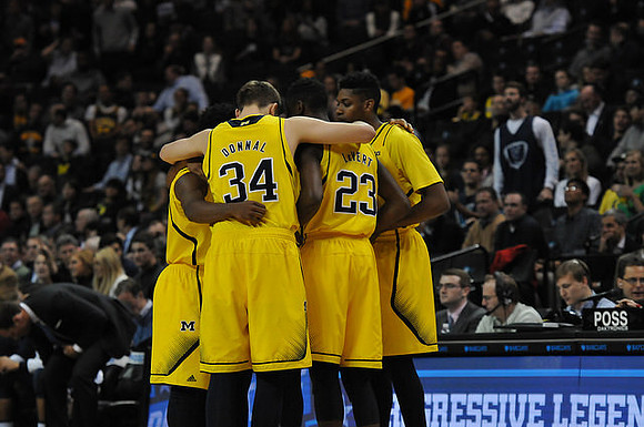 Mark Donnal (34), Caris LeVert (23), and Kameron Chatman (3)