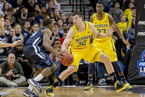 Ricky Doyle (32) and Caris LeVert (23)
