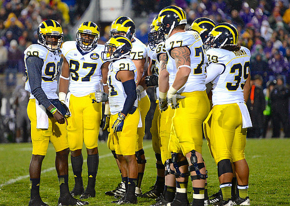 Devin Gardner (98), Devin Funchess (87), Jeremy Gallon (21), Michael Schofield (75), Kyle Bosch (65), Taylor Lewan (77), and Sione Houma (39)