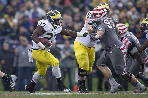 Derrick Green (27) and Kyle Bosch (65)