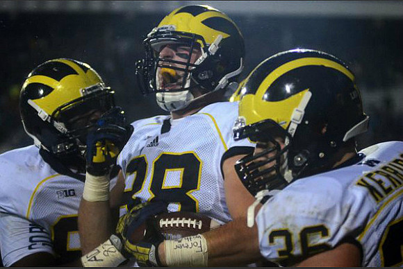 Devin Funchess (87), Jake Butt (88), and Joe Kerridge (36)