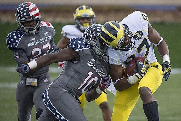 Devin Funchess (87) and Jeremy Gallon (21)
