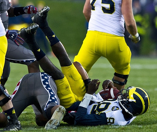 Michael Schofield (75) and Devin Gardner (98)
