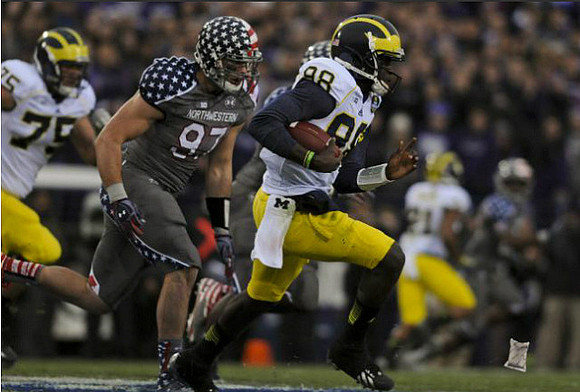 Michael Schofield (75) and Devin Gardner (98)