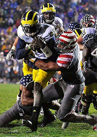 Devin Gardner (98) and Erik Magnuson (78)