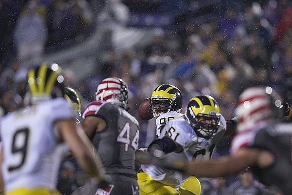 Drew Dileo (9), Devin Gardner (98), and Graham Glasgow (61)