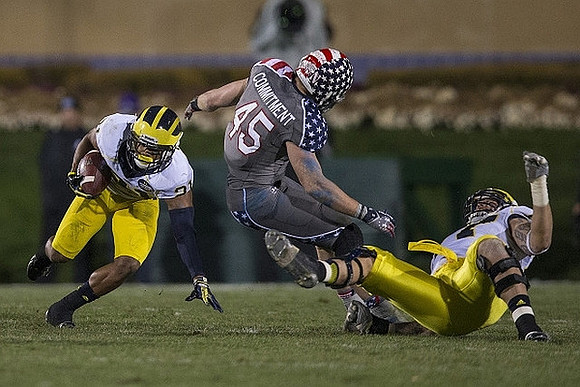 Jeremy Gallon (21) and Kyle Kalis (67)
