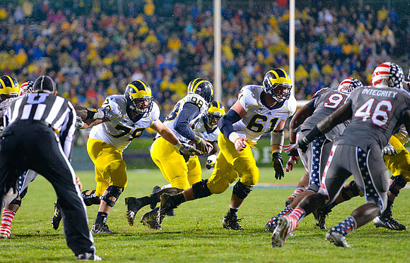 Erik Magnuson (78), Devin Gardner (98), and Graham Glasgow (61)