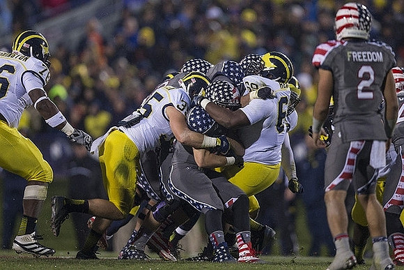 Quinton Washington (76), Joe Bolden (35), and Willie Henry (69)