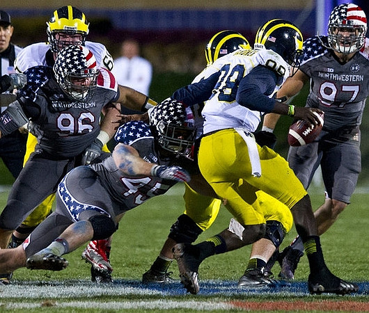 Kyle Bosch (65) and Devin Gardner (98)